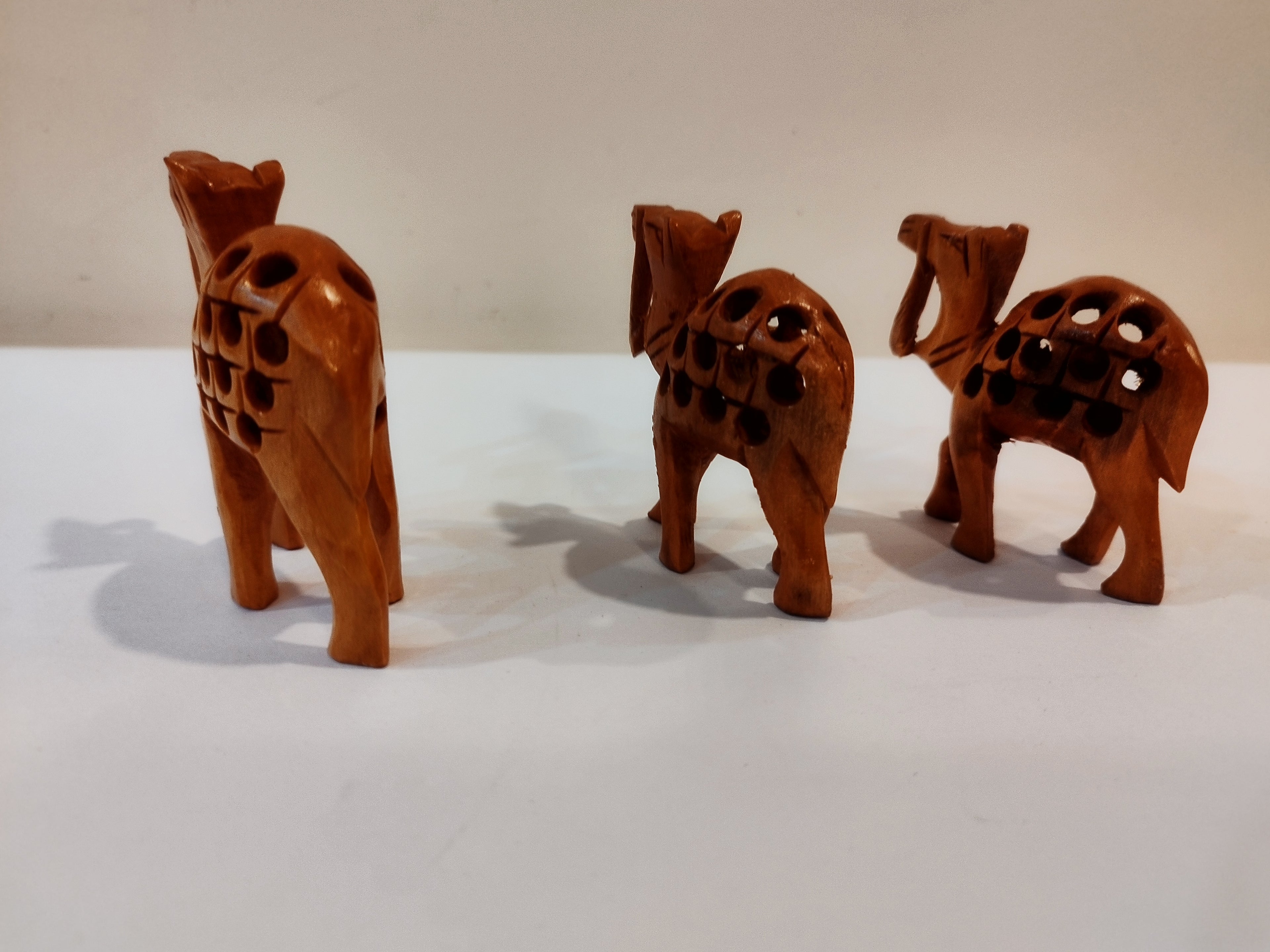 Handcrafted Kadam Wood Camel Family Statue ( set of three, eight 3,2.5 and 2 inches): Spiritual Decor