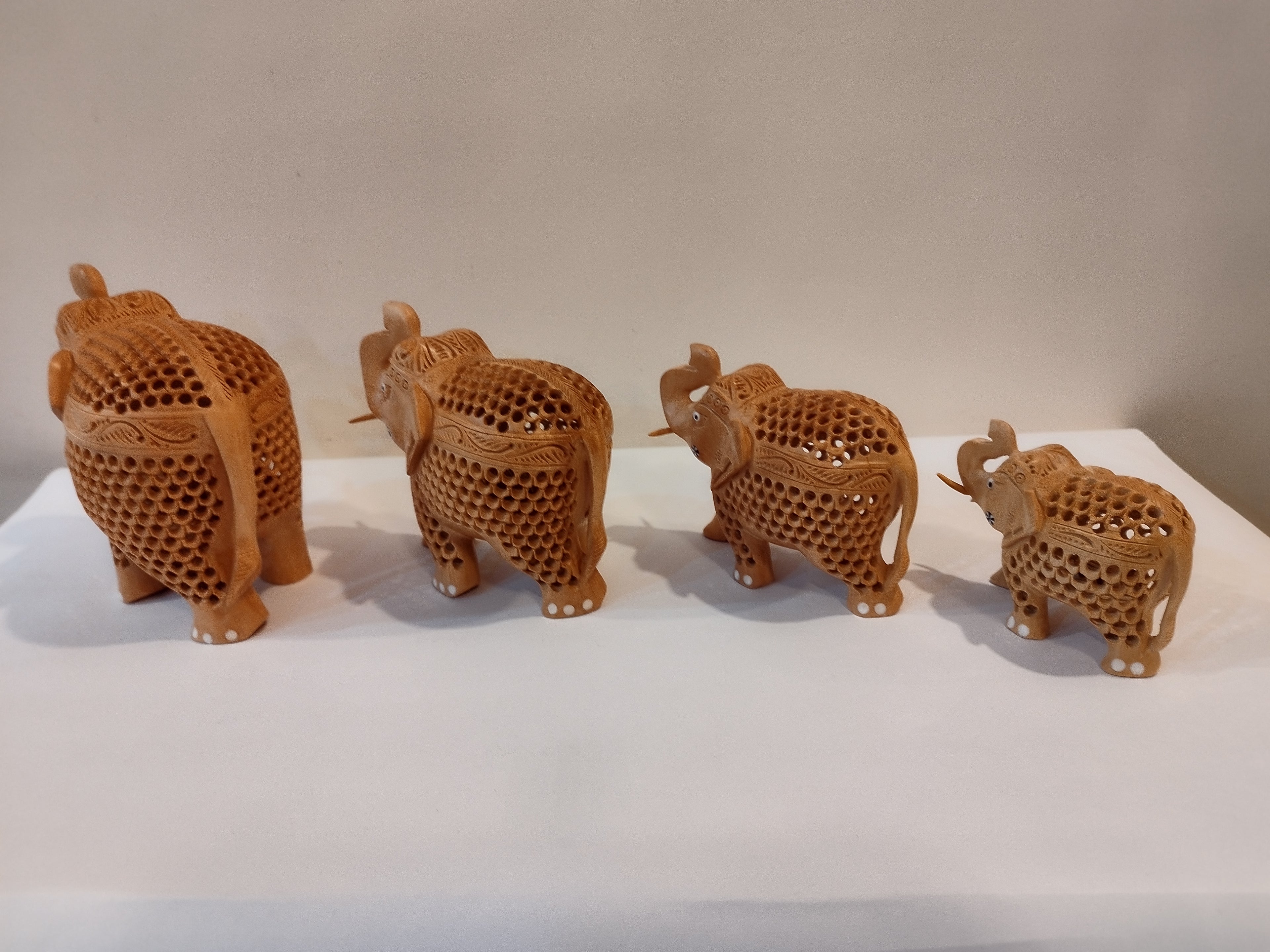 Hand Carved Kadam Wood Elephant Family ( Four elephants of the height 3,4,5 and 6 inches )- Spiritual Decor