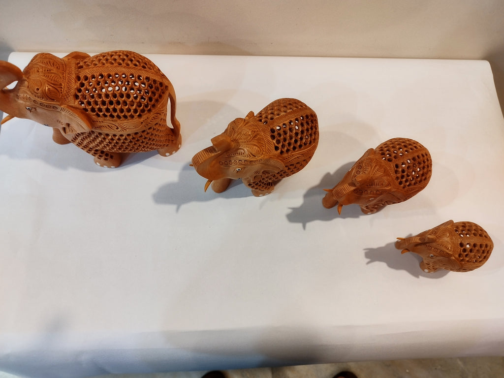 Hand Carved Kadam Wood Elephant Family ( Four elephants of the height 3,4,5 and 6 inches )- Spiritual Decor