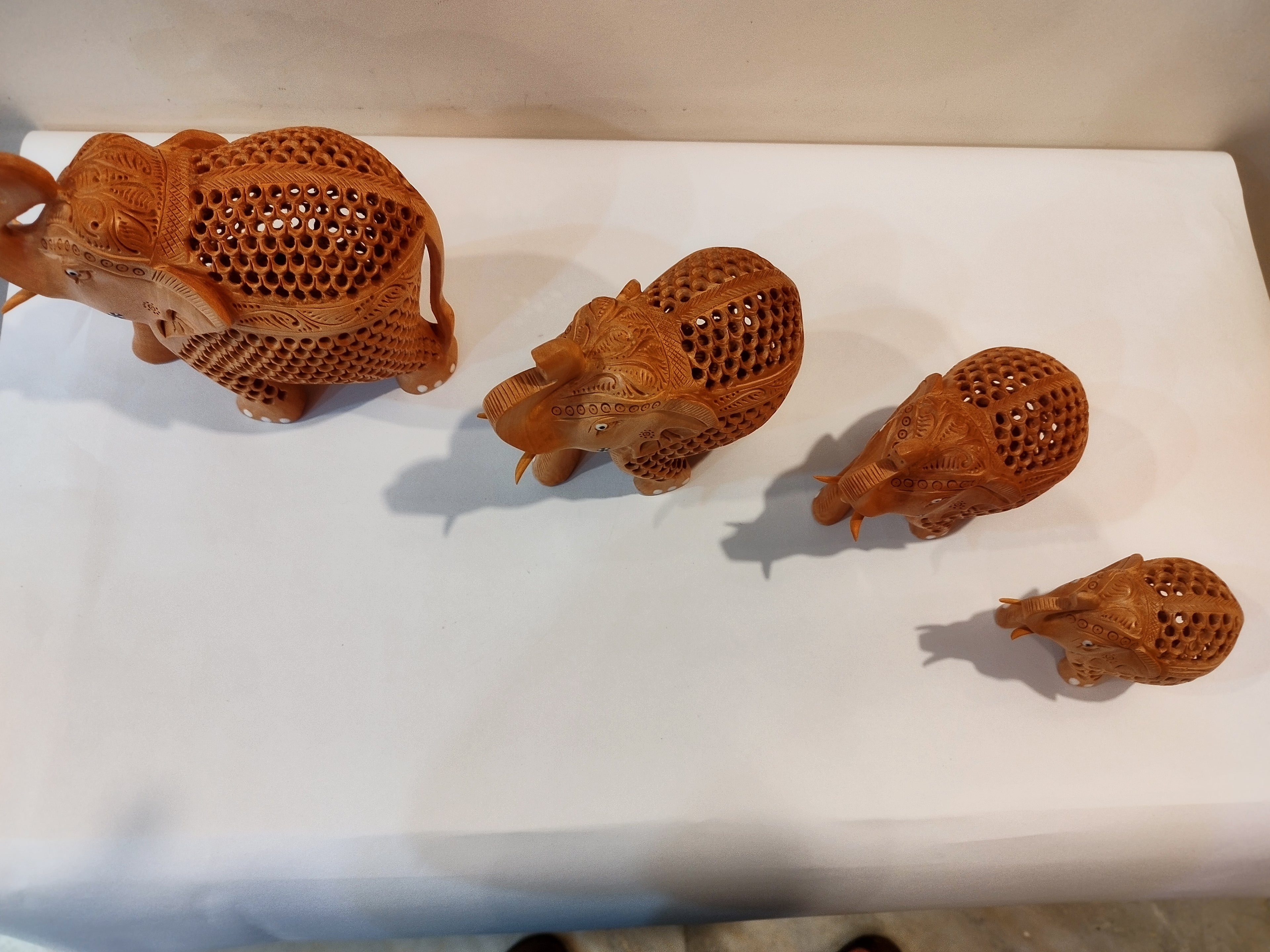 Hand Carved Kadam Wood Elephant Family ( Four elephants of the height 3,4,5 and 6 inches )- Spiritual Decor