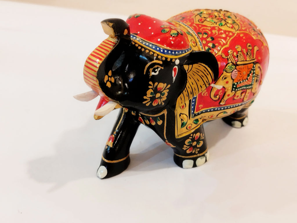 Handcrafted black kadam wood elephant painted statue-4 inches : strength, faith