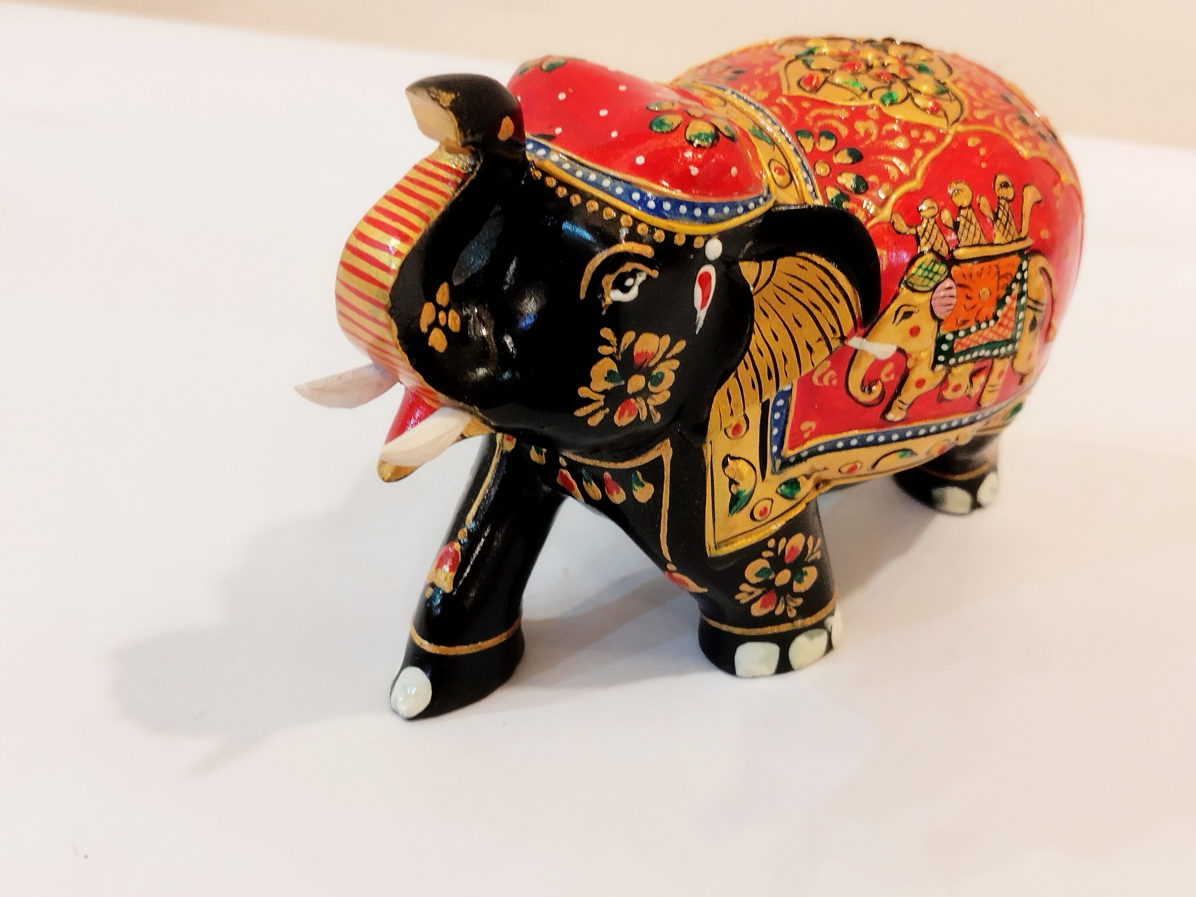 Handcrafted black kadam wood elephant painted statue-4 inches : strength, faith