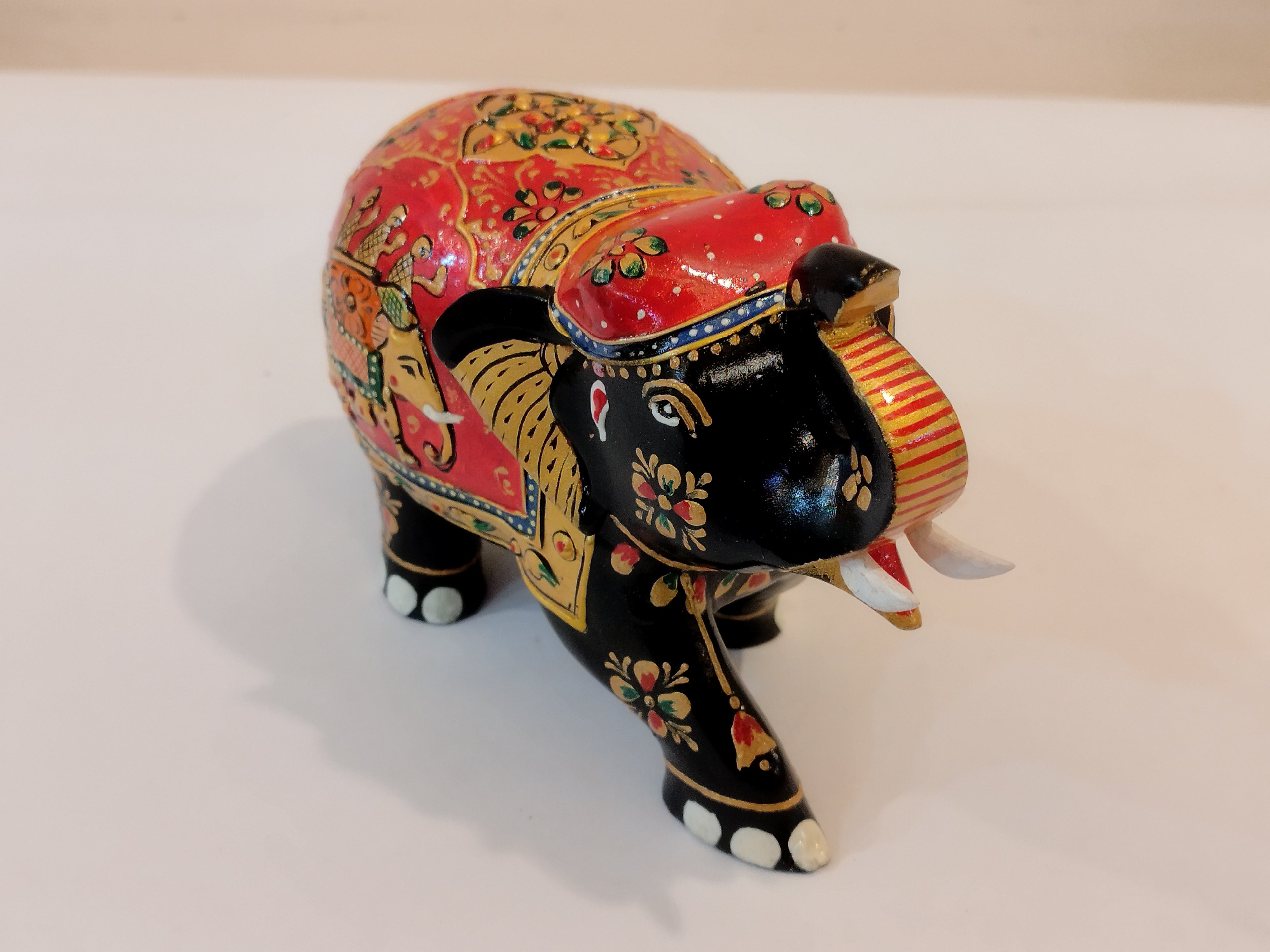 Handcrafted black kadam wood elephant painted statue-4 inches : strength, faith