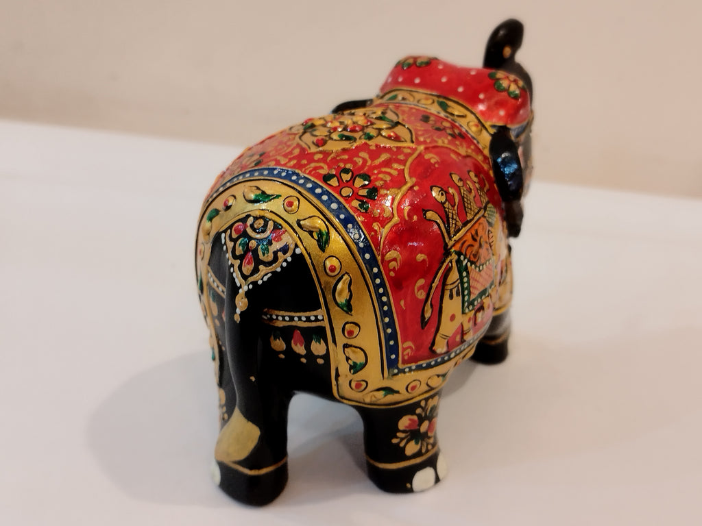 Handcrafted black kadam wood elephant painted statue-4 inches : strength, faith
