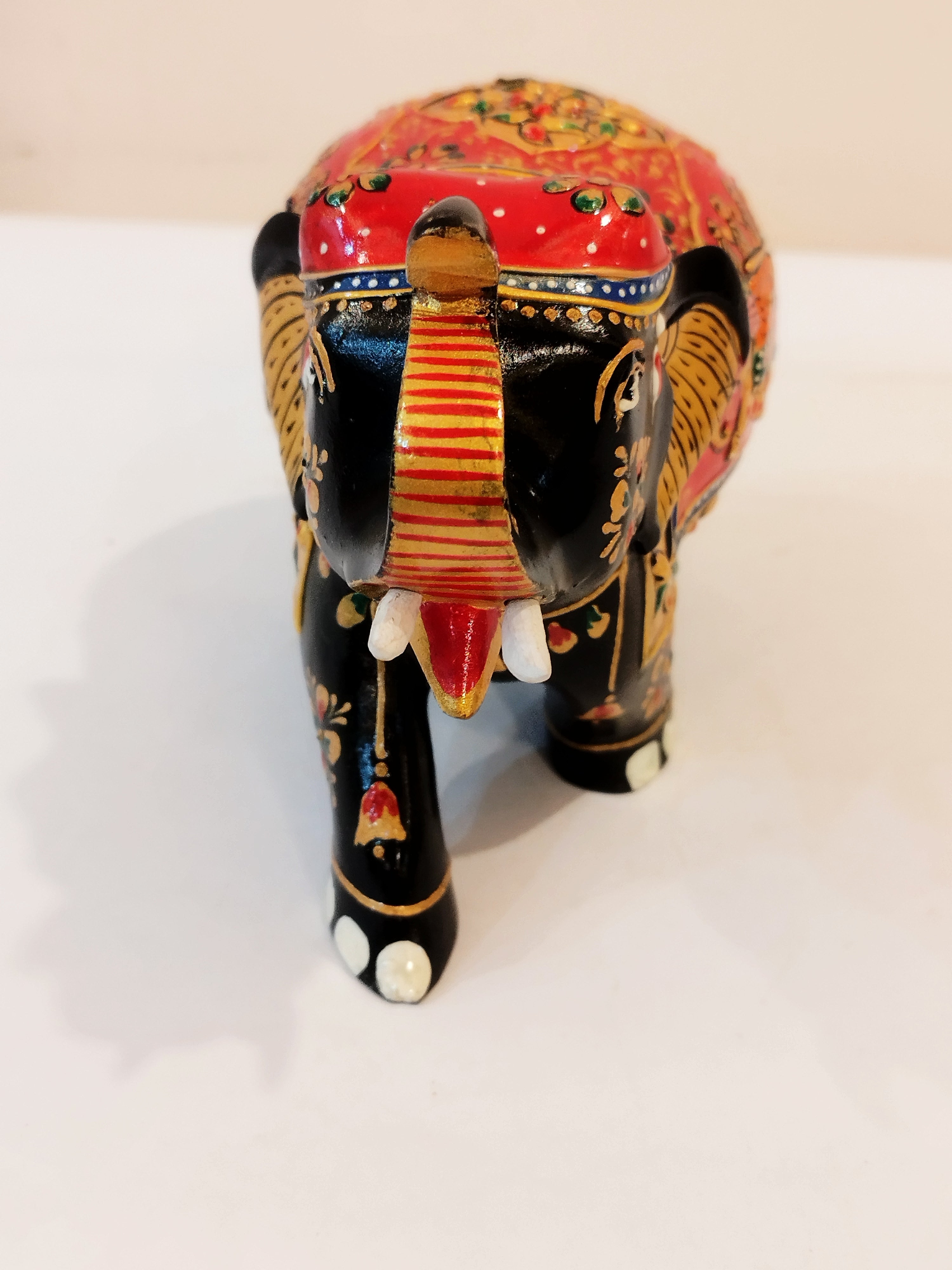 Handcrafted black kadam wood elephant painted statue-4 inches : strength, faith