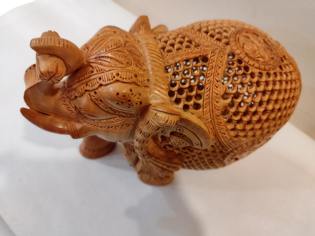 Handcrafted kadam wood beautifully carved elephant statue-8 inches: strength faith