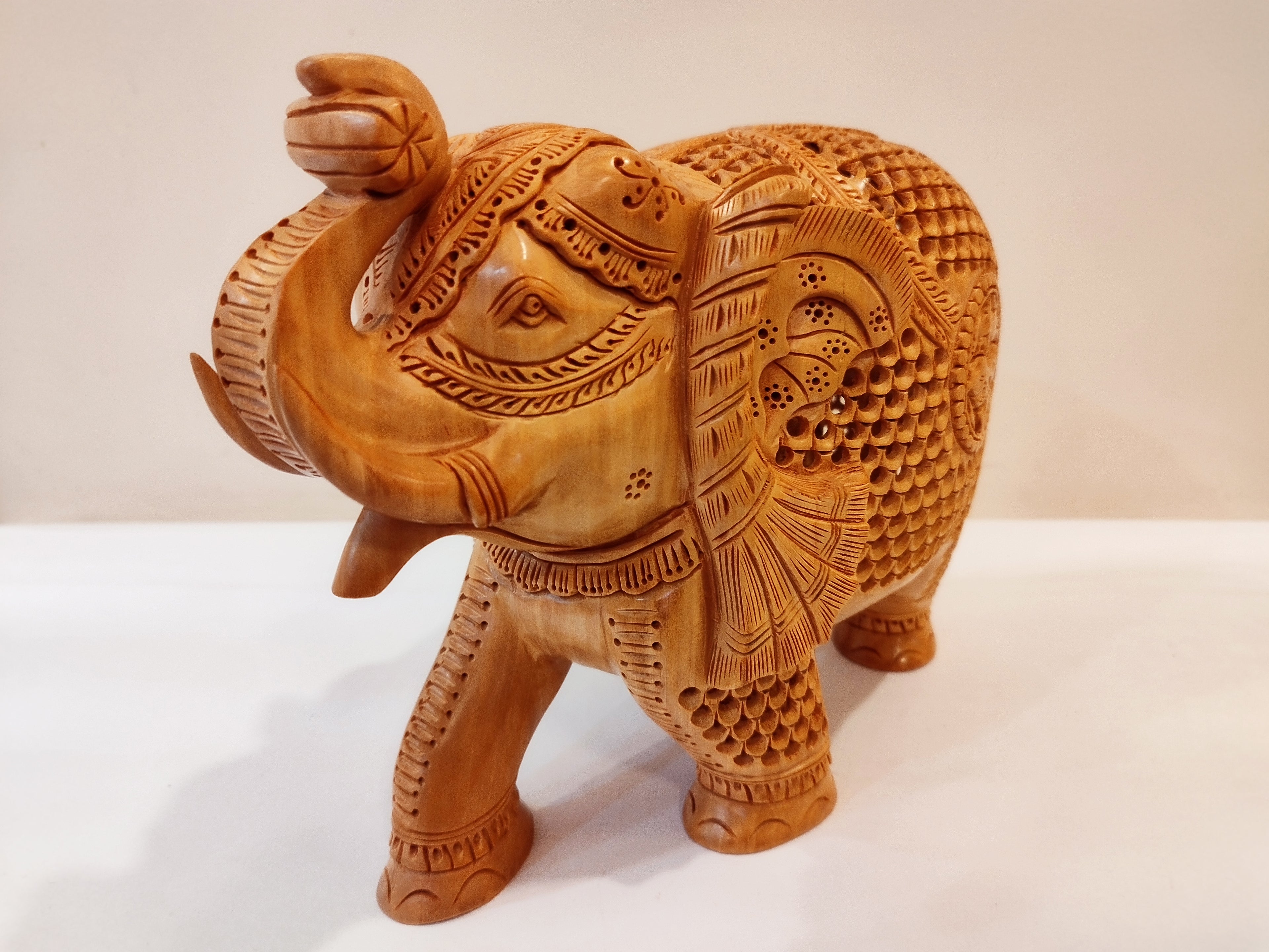 Handcrafted kadam wood beautifully carved elephant statue-8 inches: strength faith