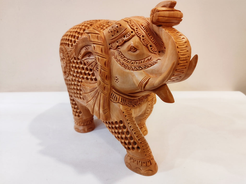Handcrafted kadam wood beautifully carved elephant statue-8 inches: strength faith