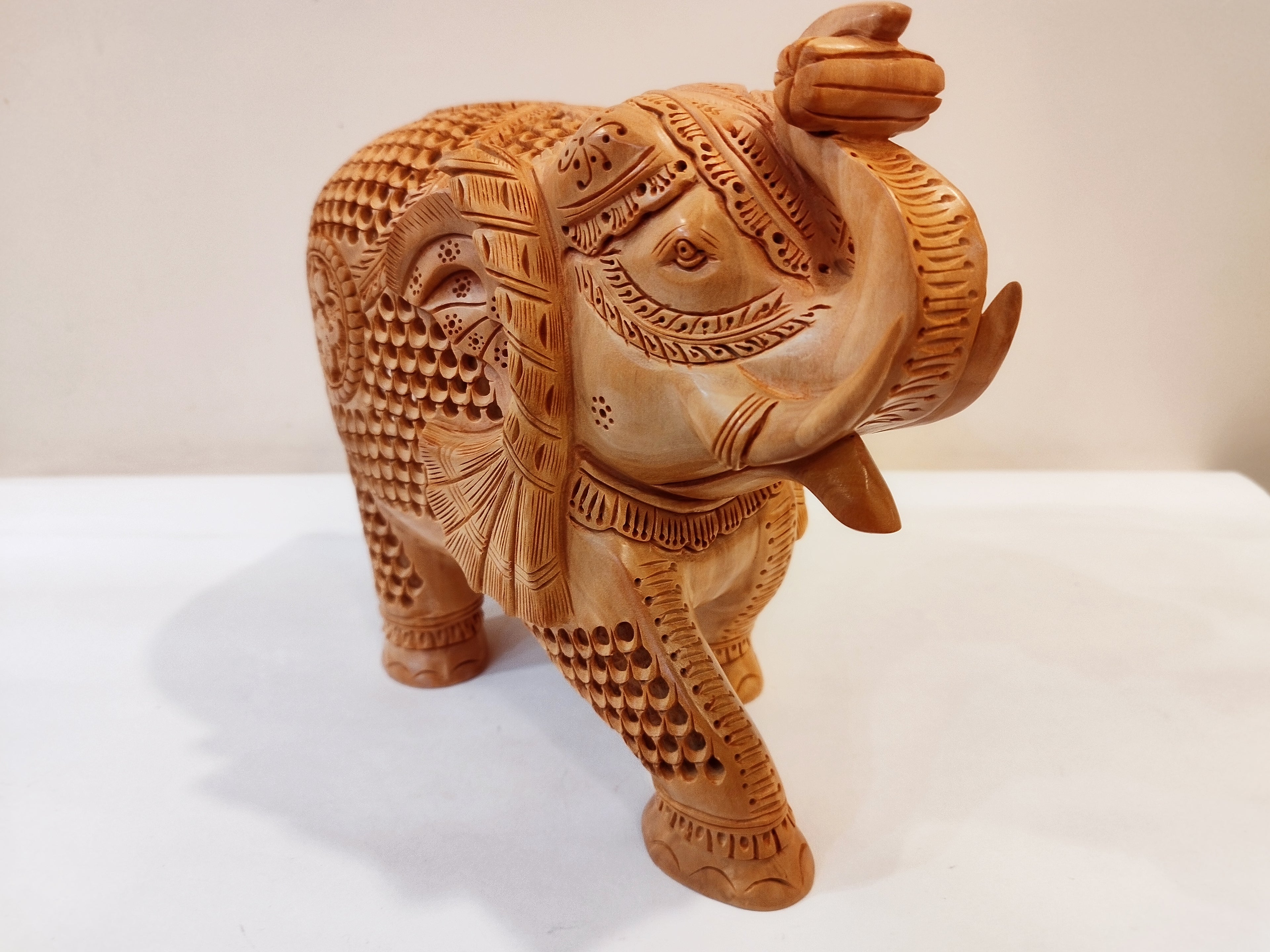 Handcrafted kadam wood beautifully carved elephant statue-8 inches: strength faith