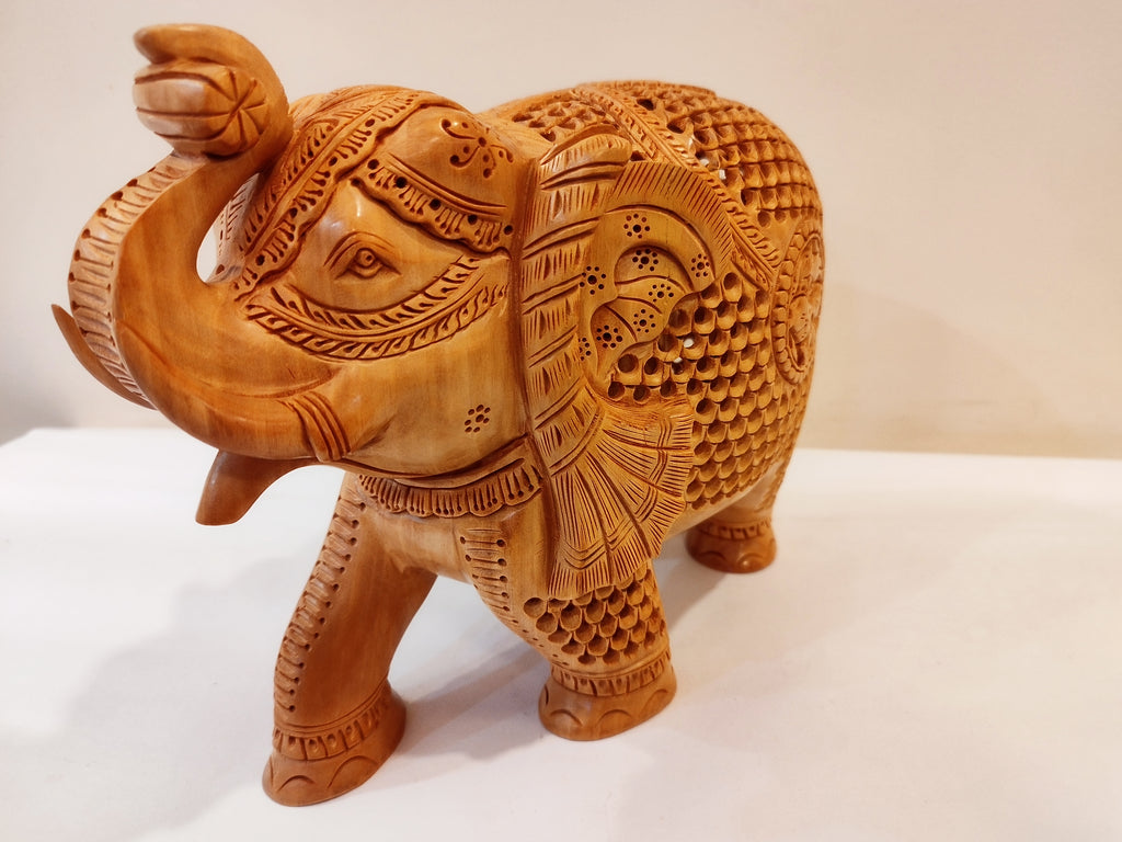 Handcrafted kadam wood beautifully carved elephant statue-8 inches: strength faith