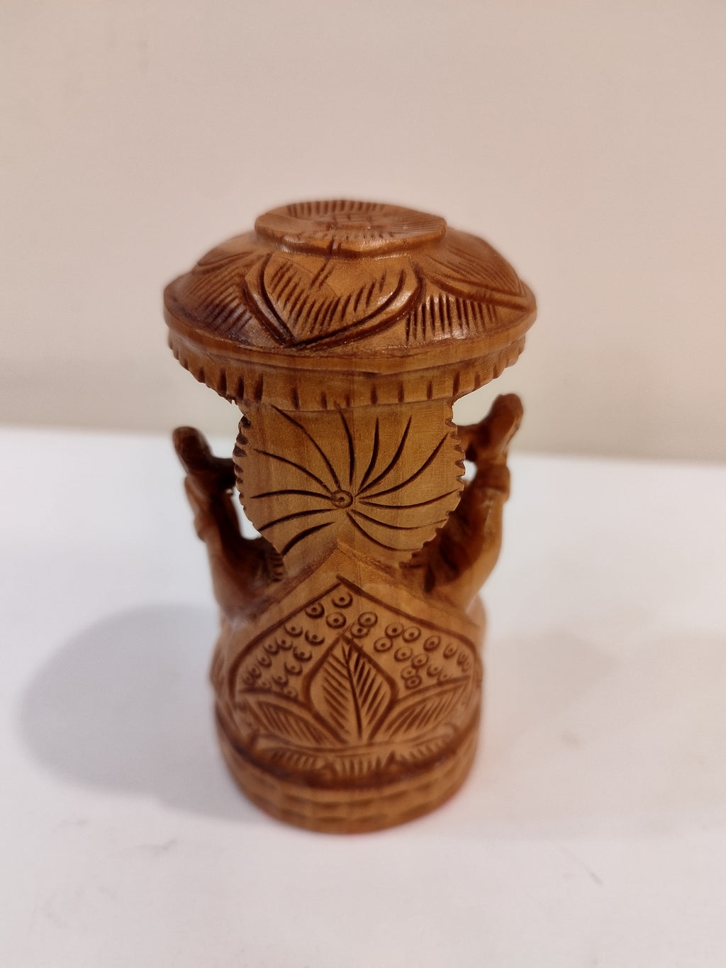 Hindu deity Vinayak, a handcrafted Kadam Wood Ganesha Statue with Chatari