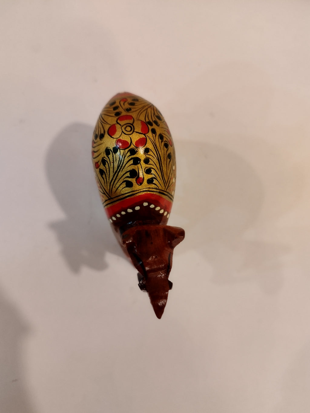 Hand Carved Camel painted in Kadam wood, height 4 inches. A desert animal for gifting.