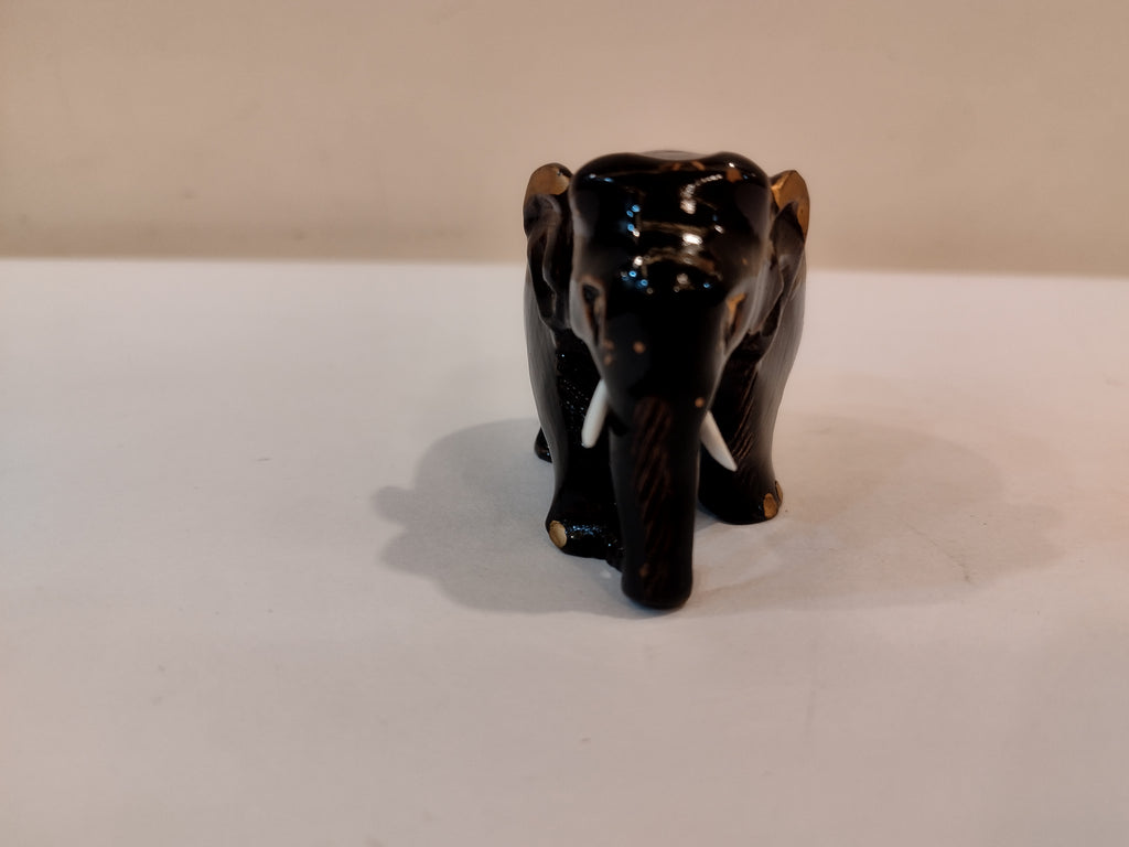 Handcrafted kadam wood black elephant statue  down trunk- 2 inches