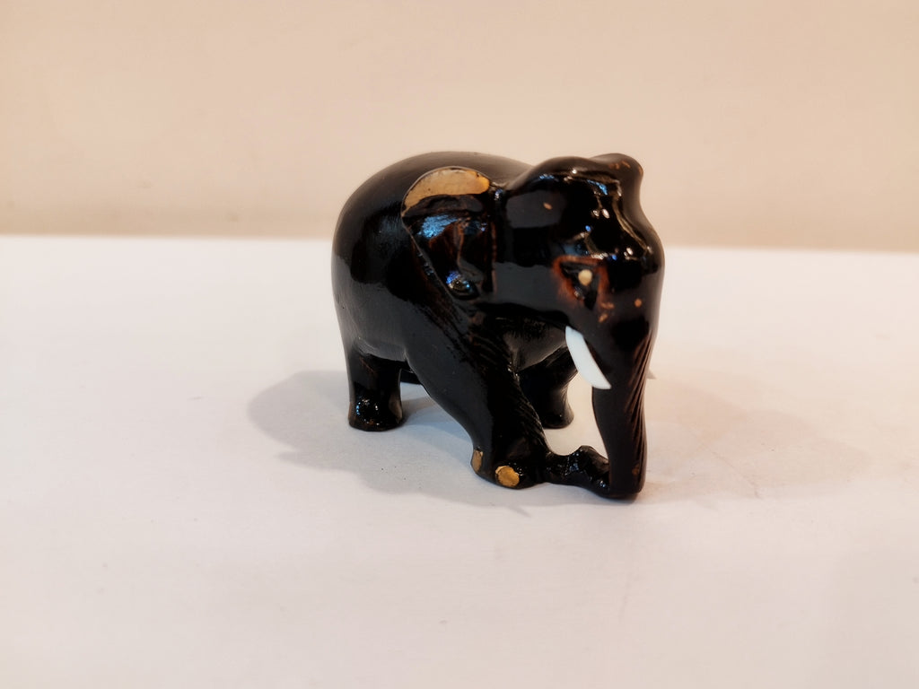 Handcrafted kadam wood black elephant statue  down trunk- 2 inches