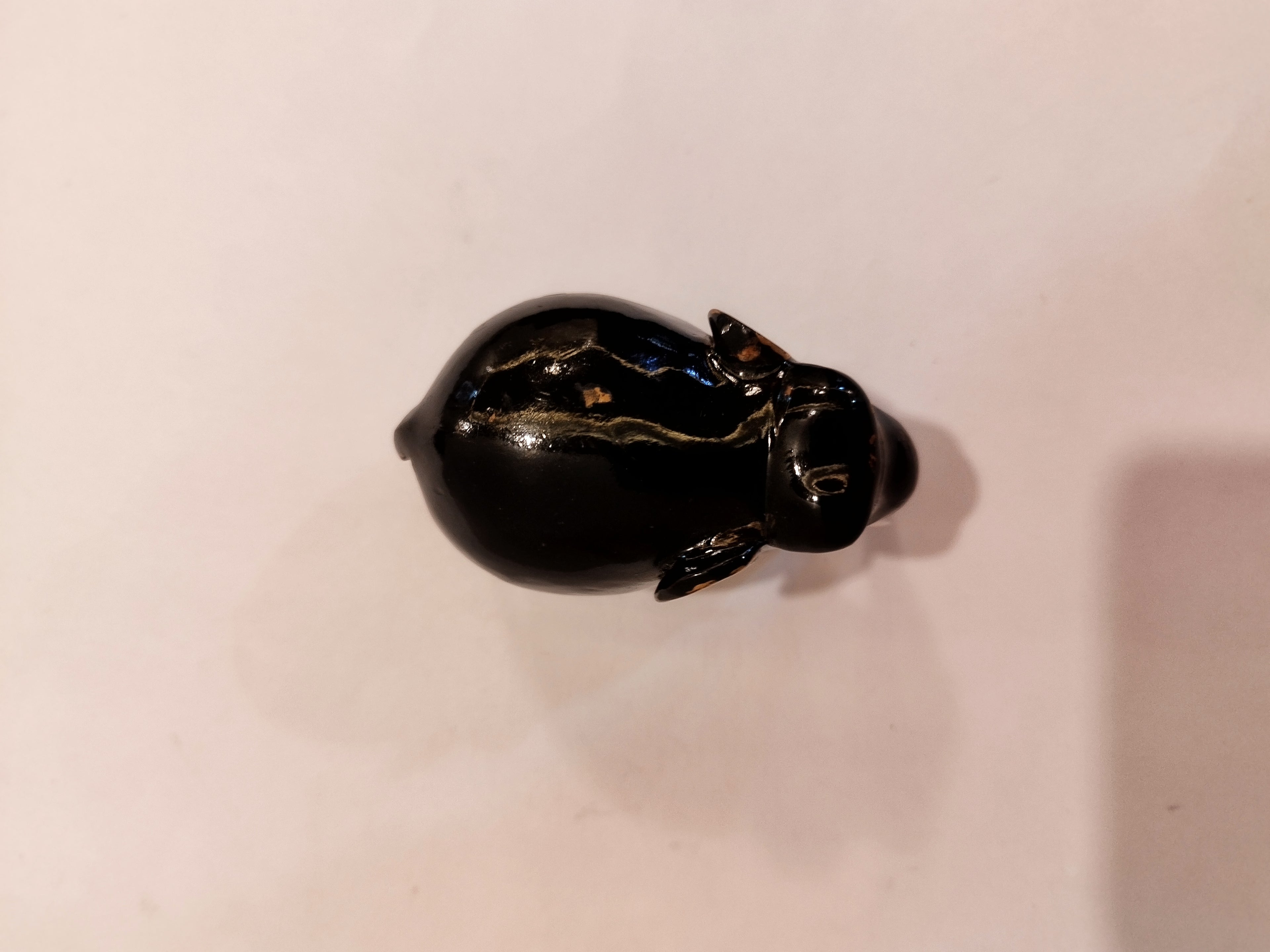 Handcrafted kadam wood black elephant statue  down trunk- 2 inches