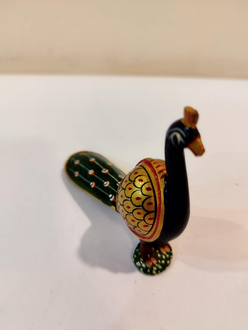 Handcrafted kadam wood peacock figurine spiritual home decor