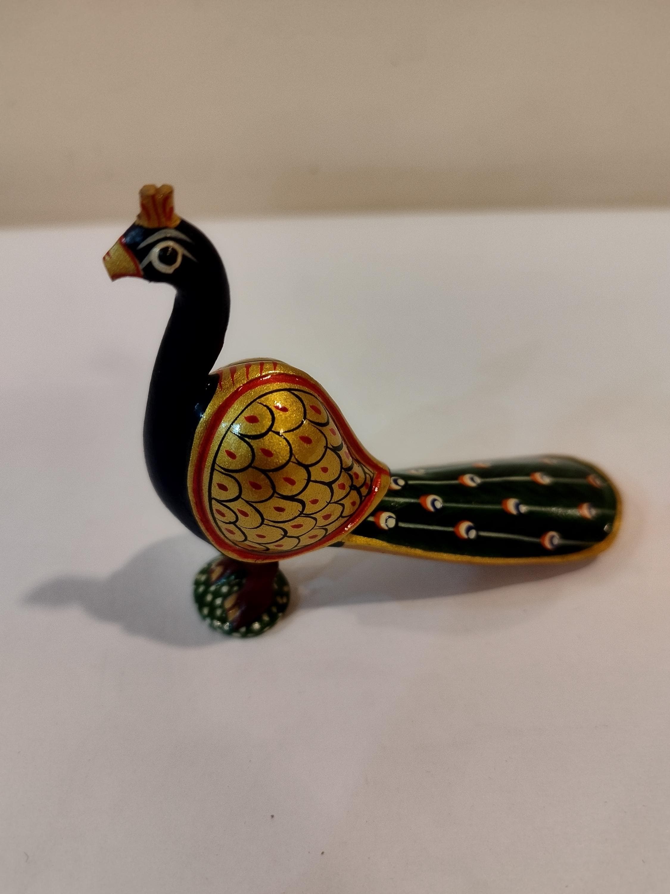 Handcrafted kadam wood peacock figurine spiritual home decor