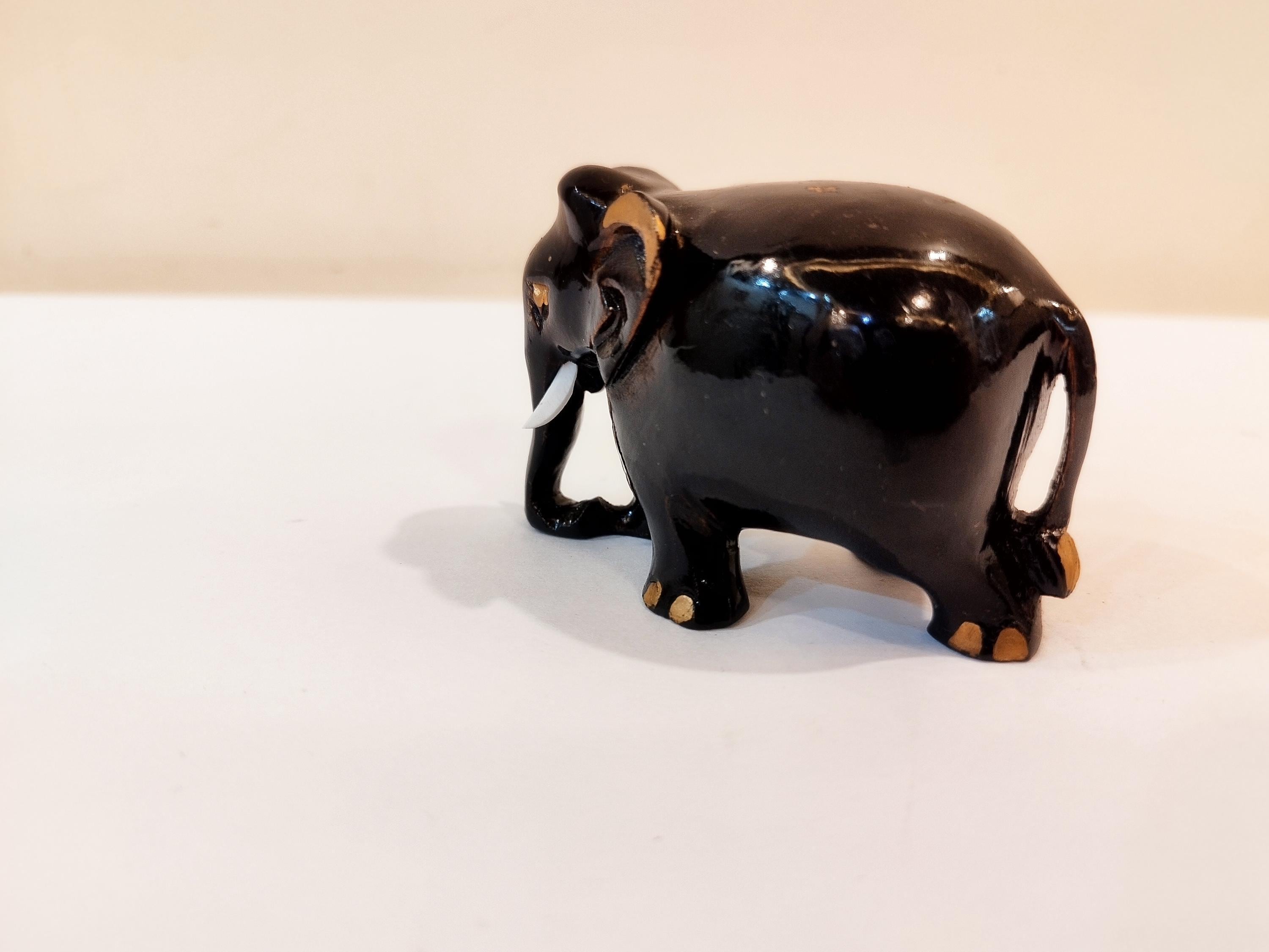 Handcrafted kadam wood black elephant statue  down trunk- 2 inches