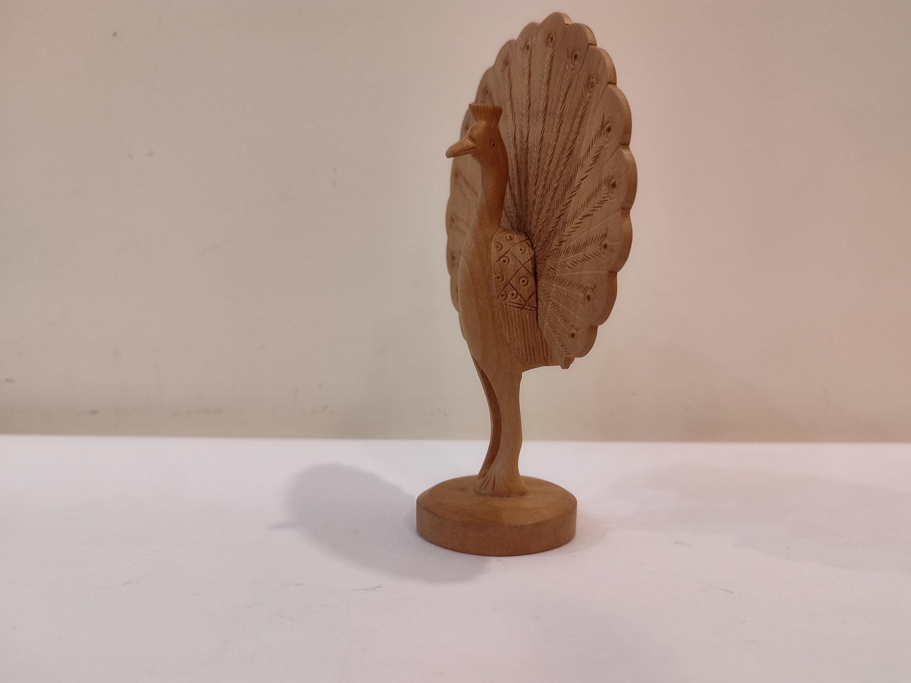 Peacock dancing, five inches in height. gives peace and prosperity in all festival