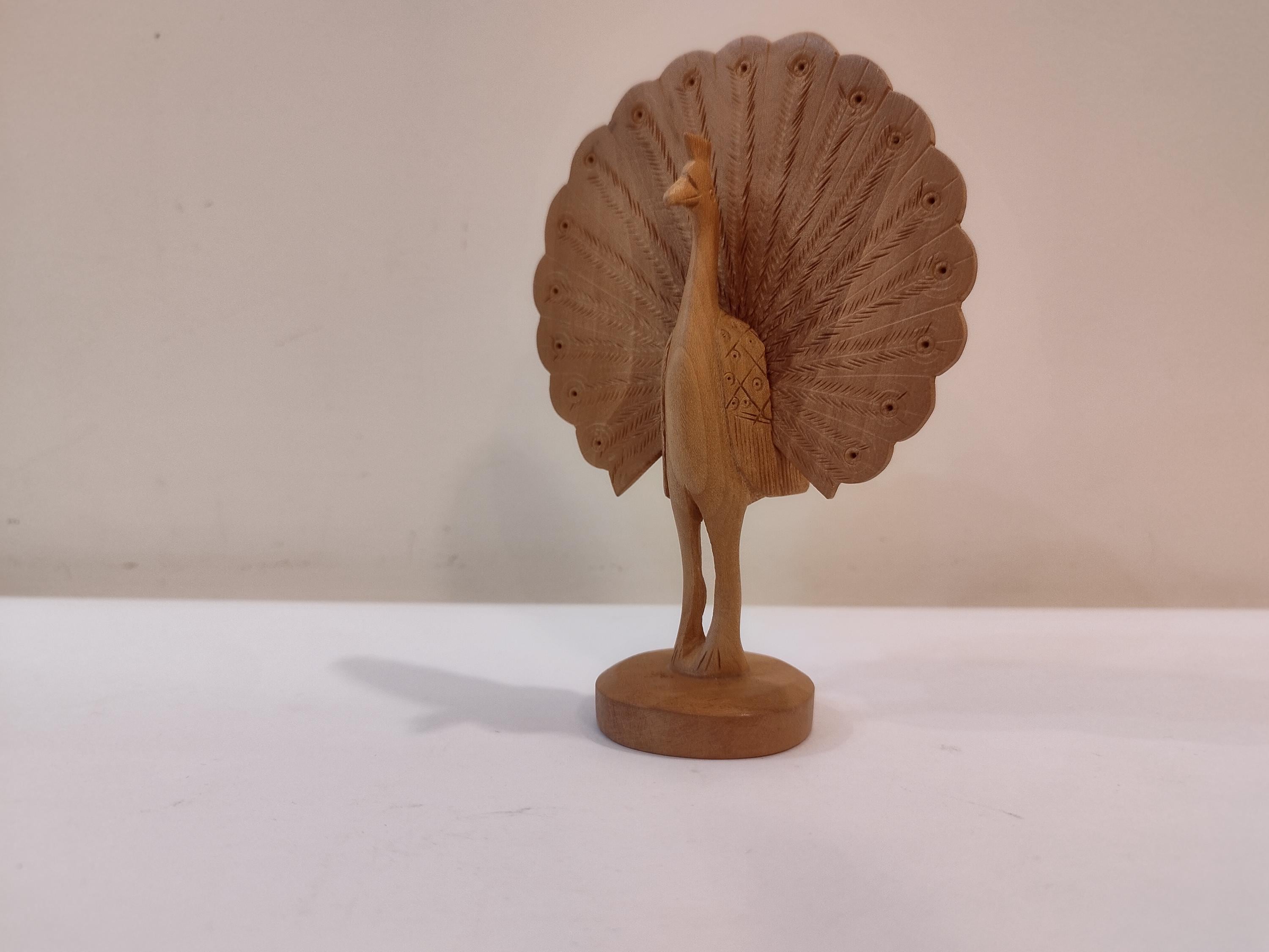 Peacock dancing, five inches in height. gives peace and prosperity in all festival