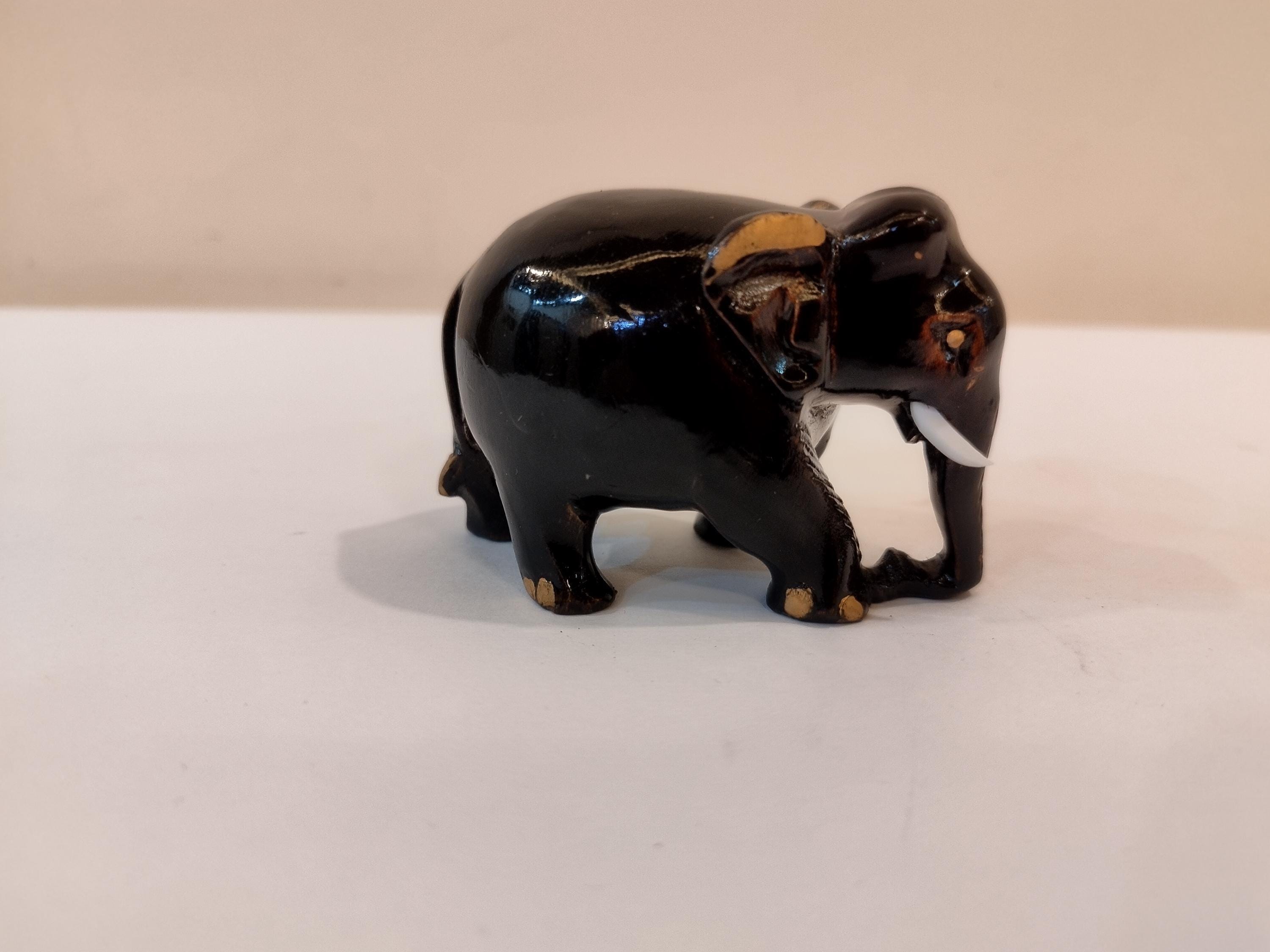 Handcrafted kadam wood black elephant statue  down trunk- 2 inches