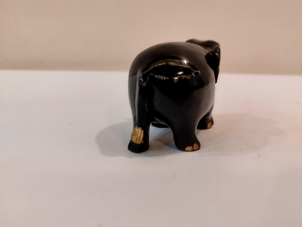 Handcrafted kadam wood black elephant statue  down trunk- 2 inches