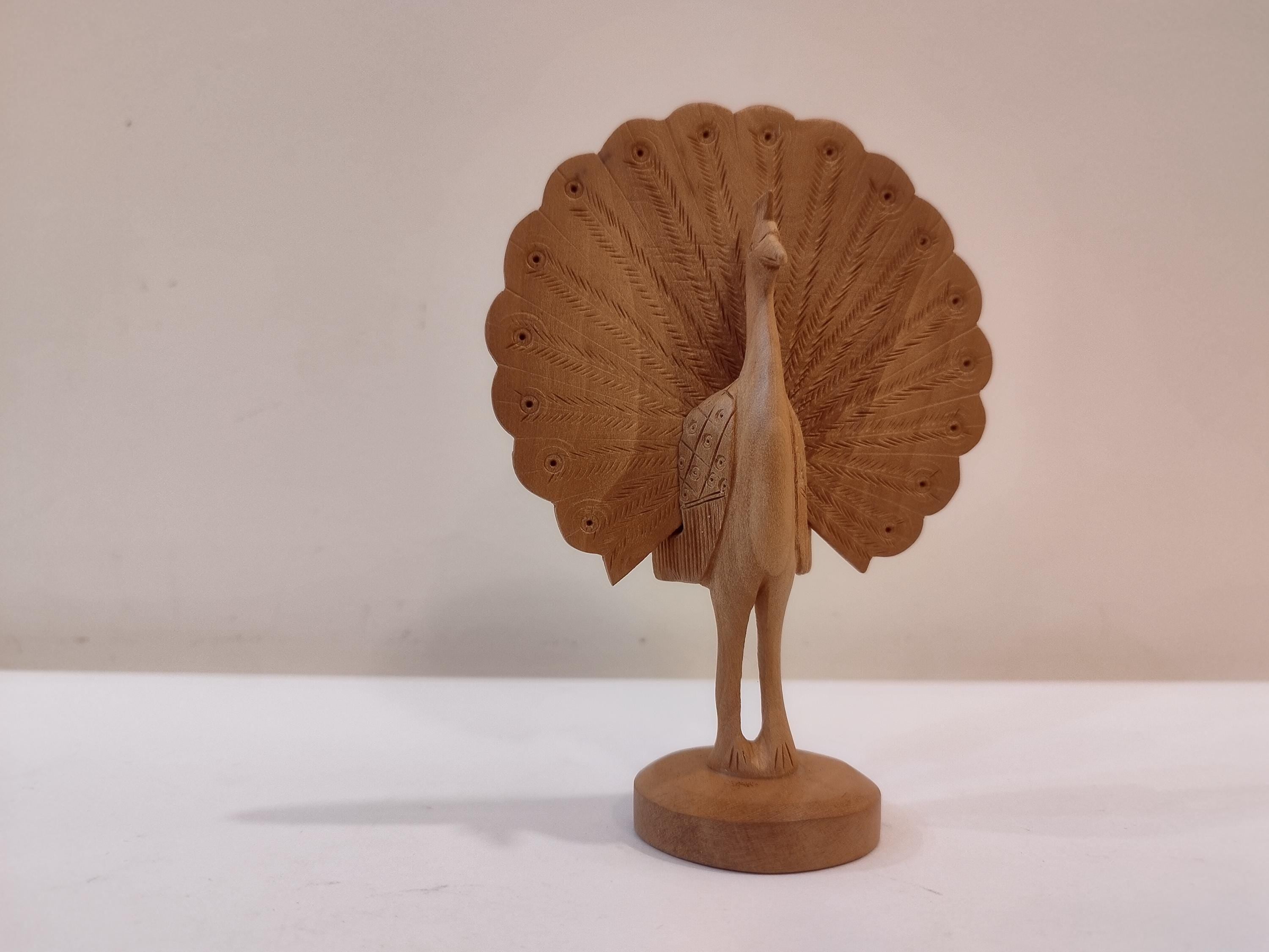 Peacock dancing, five inches in height. gives peace and prosperity in all festival