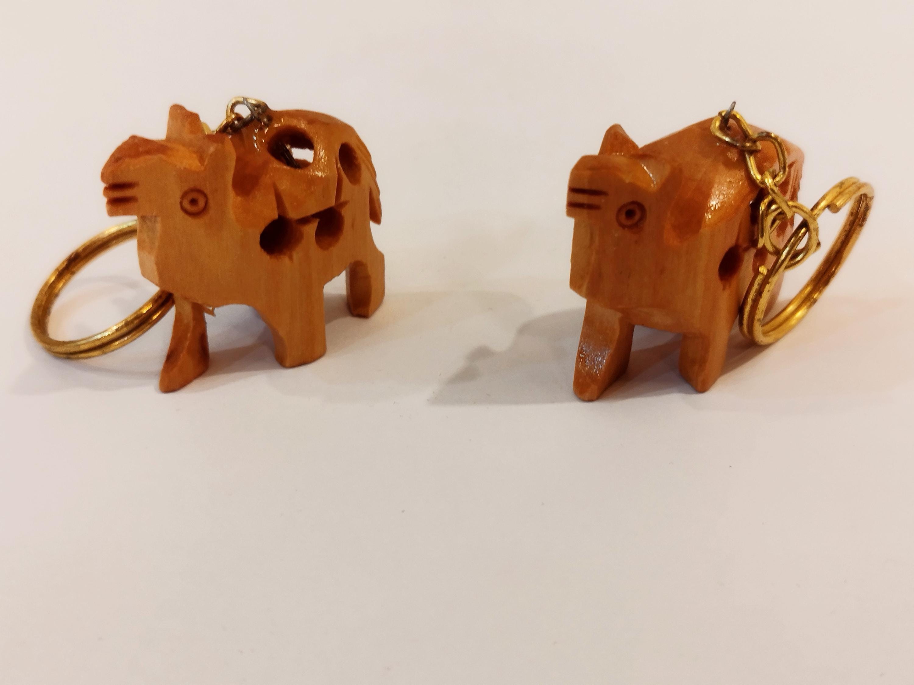 Hand carved camel kadam wood key chain set of 5: a desert animal for gifting.