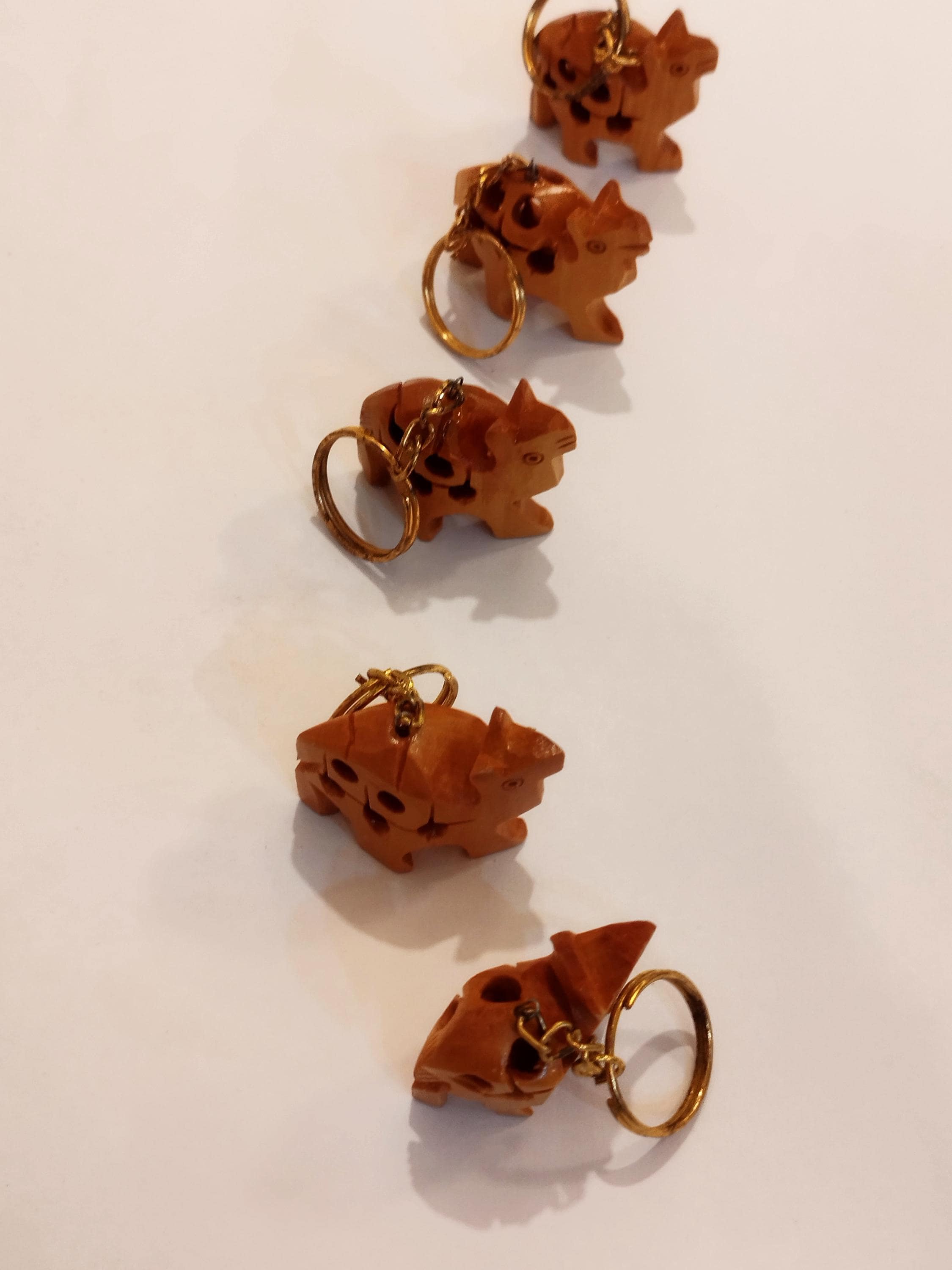 Hand carved camel kadam wood key chain set of 5: a desert animal for gifting.