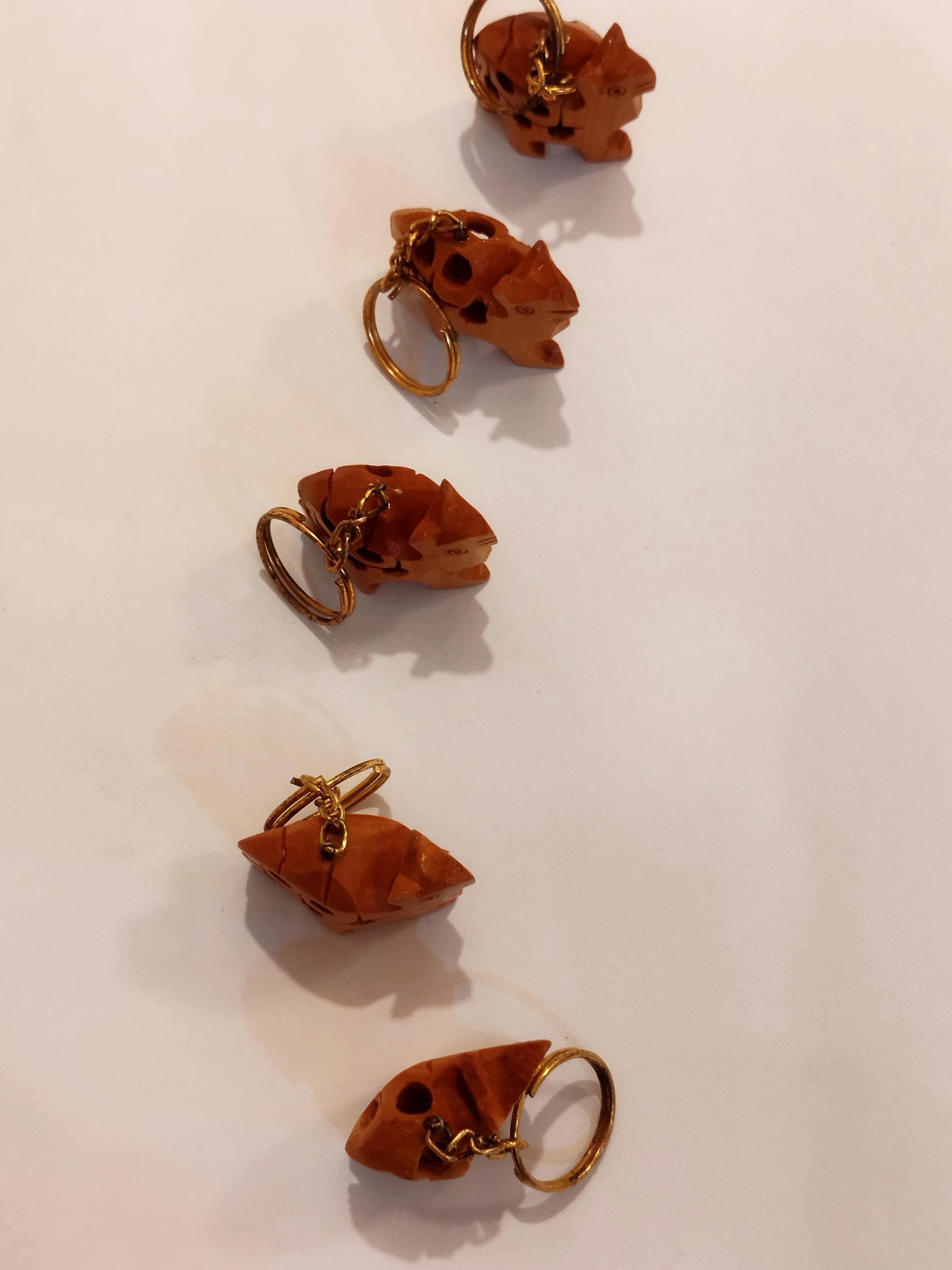 Hand carved camel kadam wood key chain set of 5: a desert animal for gifting.
