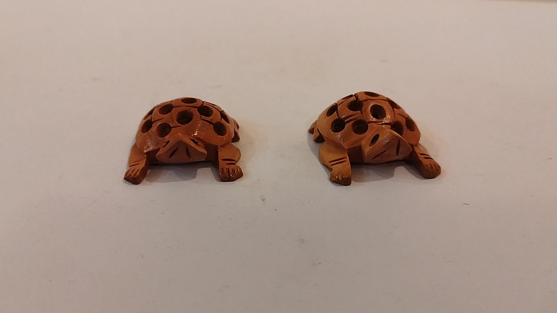 Handcrafted Kadam Wood Tortoise pair in net design Spiritual Decor
