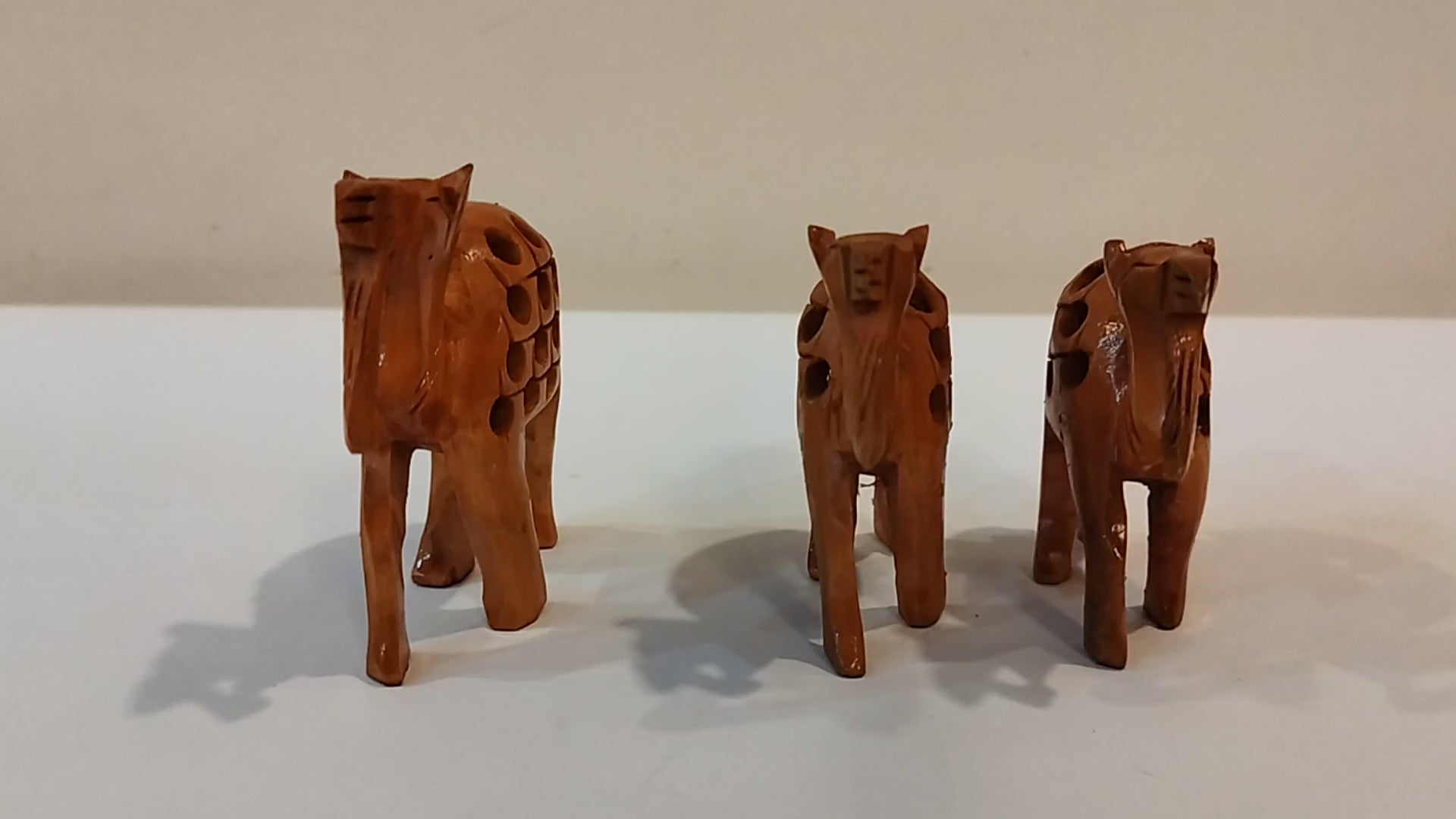 Handcrafted Kadam Wood Camel Family Statue ( set of three, eight 3,2.5 and 2 inches): Spiritual Decor