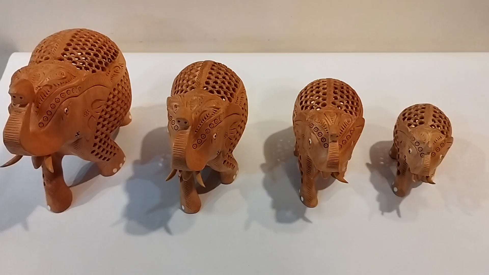 Hand Carved Kadam Wood Elephant Family ( Four elephants of the height 3,4,5 and 6 inches )- Spiritual Decor