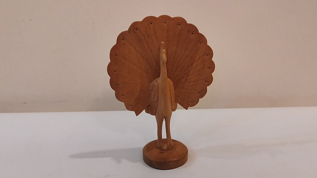 Peacock dancing, five inches in height. gives peace and prosperity in all festival