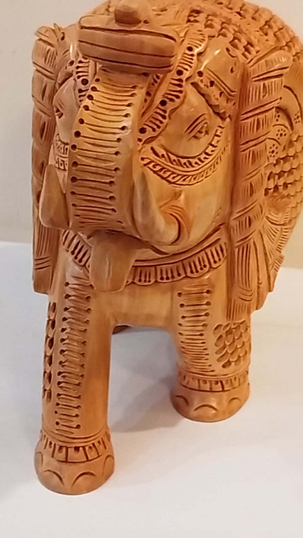 Handcrafted kadam wood beautifully carved elephant statue-8 inches: strength faith