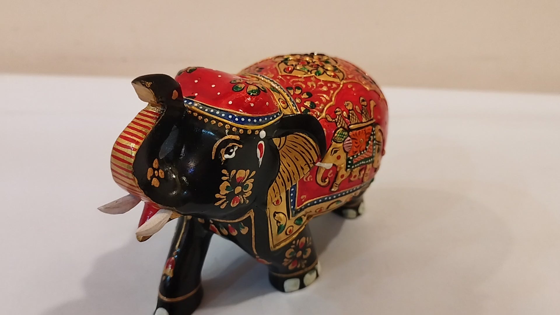 Handcrafted black kadam wood elephant painted statue-4 inches : strength, faith